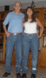 This is me and my dad (who is 7 inches taller than me) wearing his jeans and shoes to show my weirdly long legs.